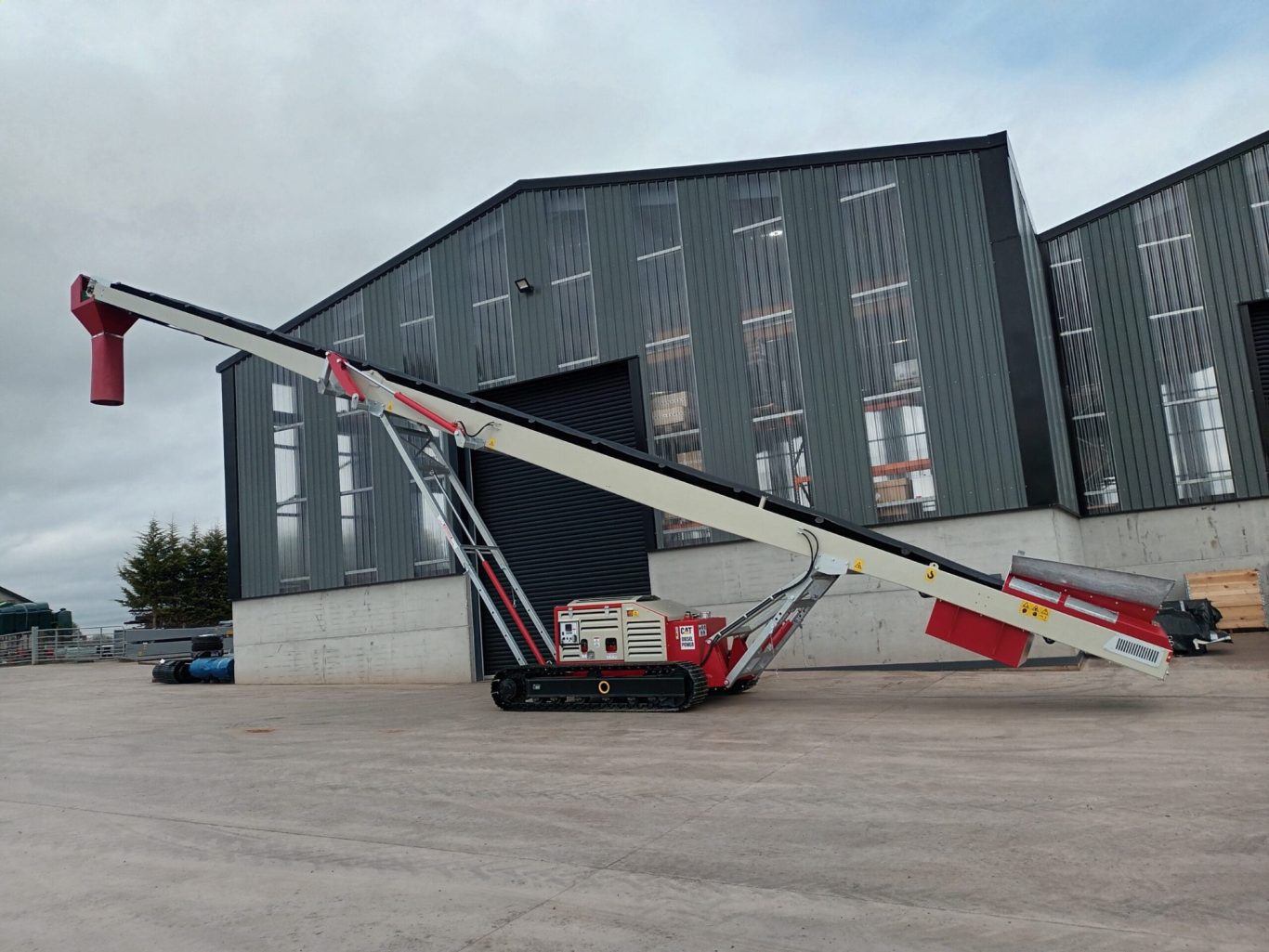 conveyor belt on tracks , with bespoke chute, hopper the conveyor shop